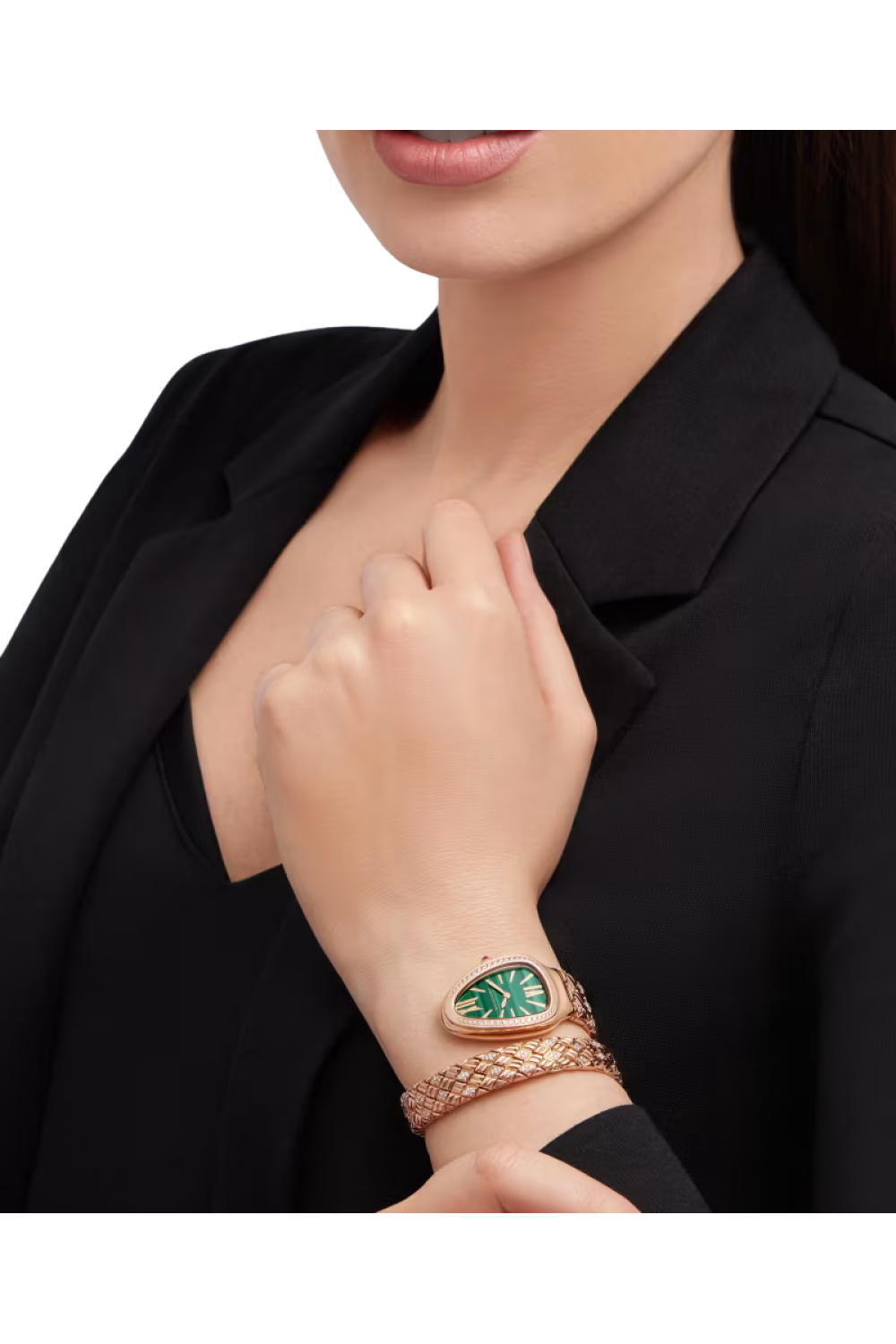 Serpenti Spiga single-spiral watch with 18 kt rose gold case set with diamonds, malachite dial and 18 kt rose gold bracelet partially set with brilliant-cut diamonds.