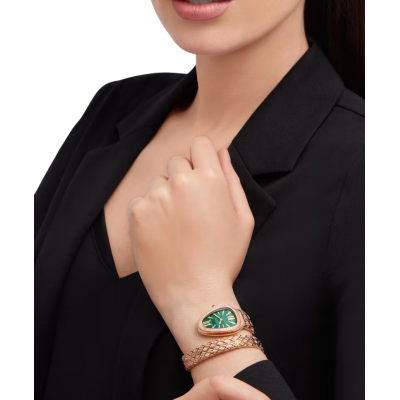 Serpenti Spiga single-spiral watch with 18 kt rose gold case set with diamonds, malachite dial and 18 kt rose gold bracelet partially set with brilliant-cut diamonds.